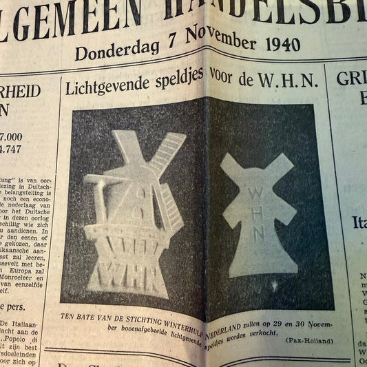 winterhulp nederland luminous badge advertisement whn propaganda newspaper 1940