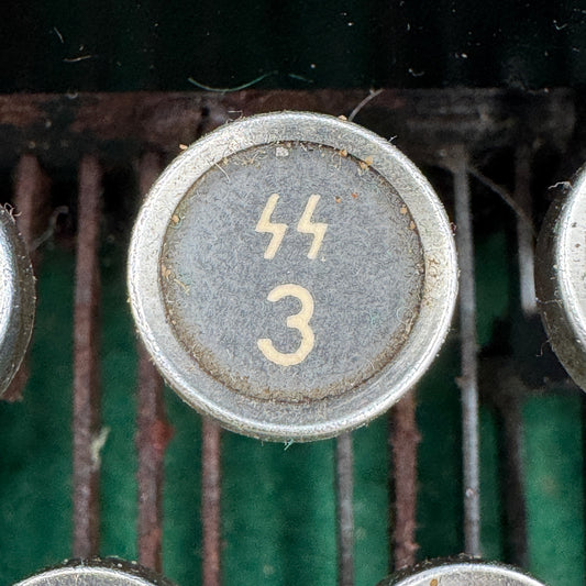 WW2 original artifact – WW2 Triumph Typewriter with SS key – interior detail