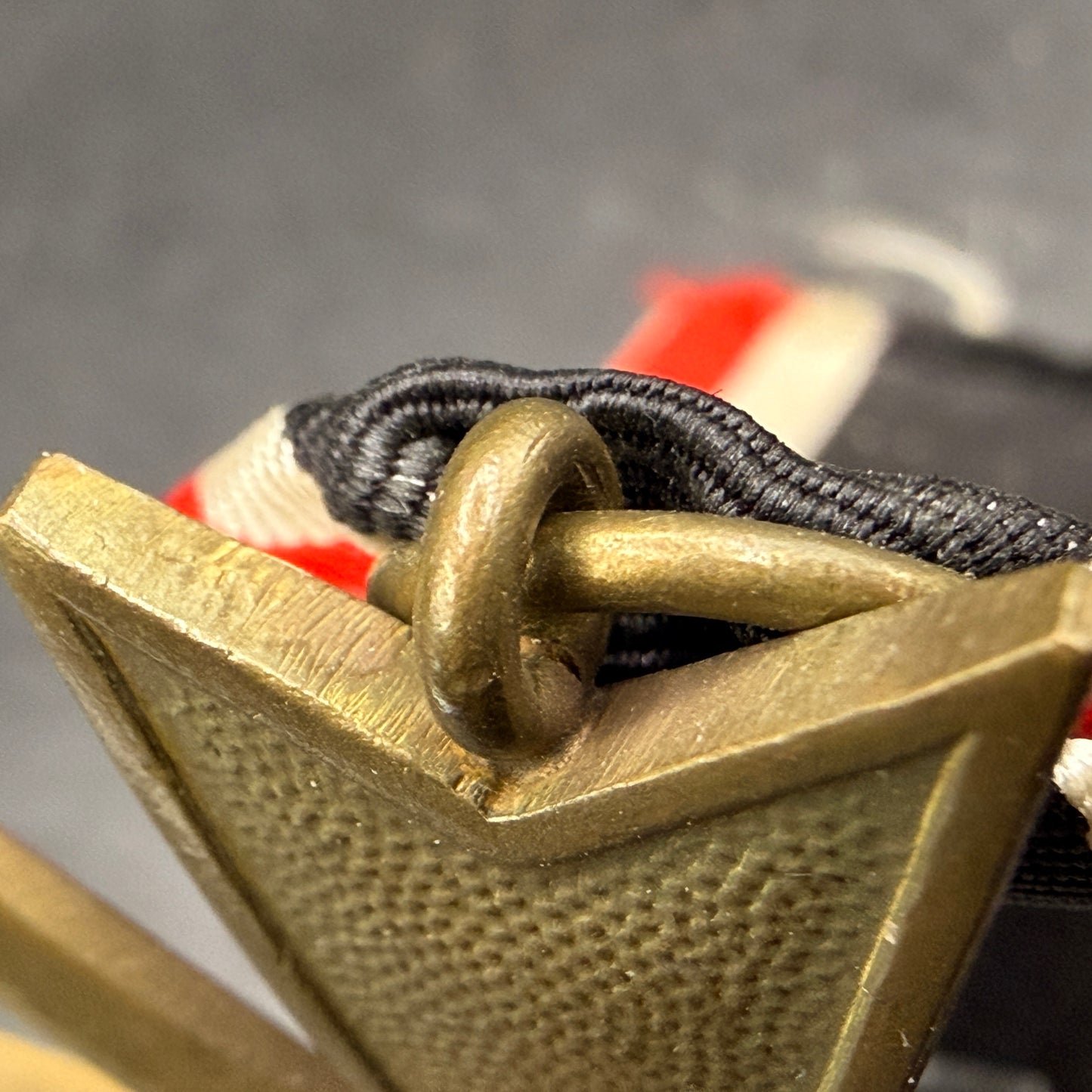 WW2 original artifact – Kriegsverdienst Kreuz with Swords and ribbon – interior page