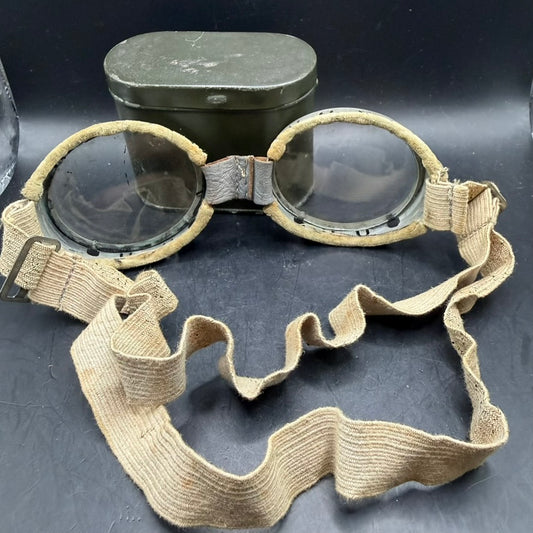 Rear view of British WWII goggles with intact elastic straps