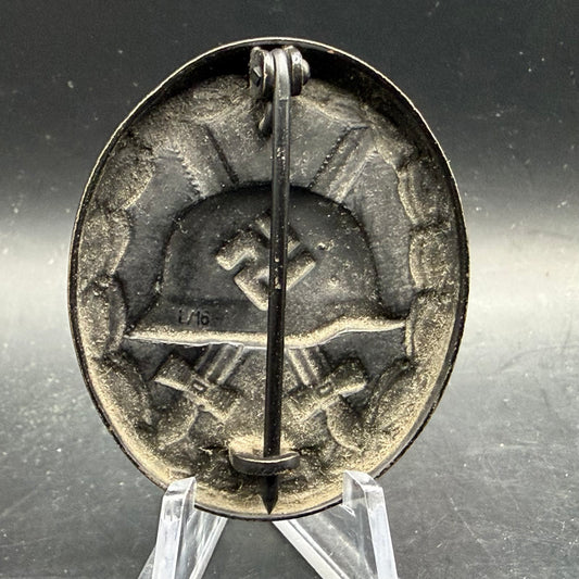 Rear view showing L/16 maker mark and pin assembly