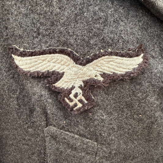 Original embroidered Luftwaffe breast eagle on private purchase WWII German coat
