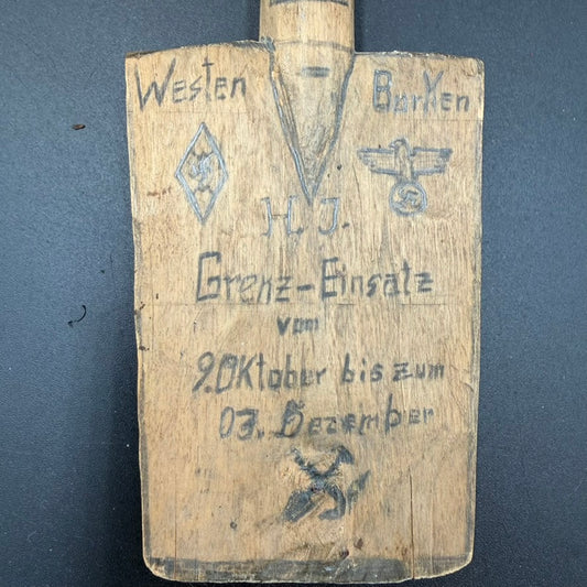 Close-up of Westenborken and service dates carved into shovel