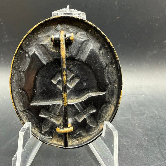 Reverse of WWII German Wound Badge in Black showing block hinge and question mark catch