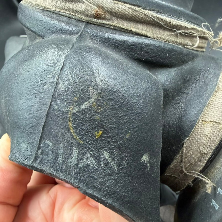 Detail of rubber condition and wartime wear on gas mask