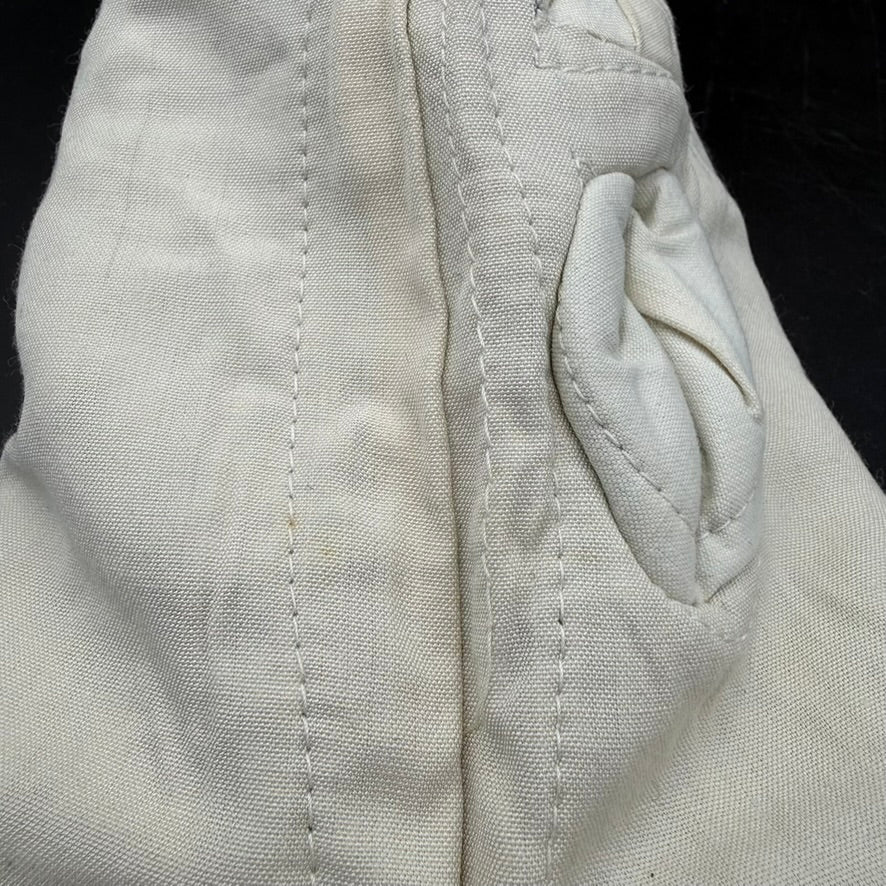 Side view highlighting thumb and trigger finger layout