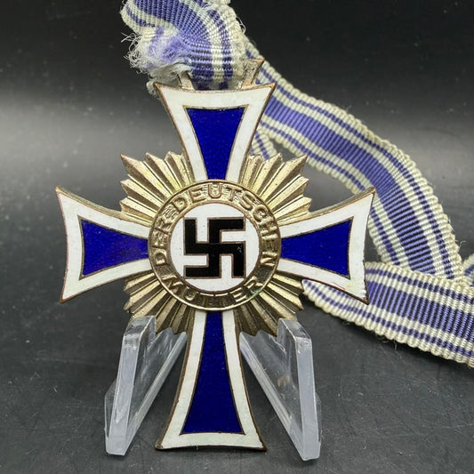 WWII German Mother’s Cross Mutterkreuz detail showing enamel and ribbon attachment
