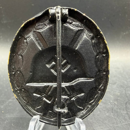 Reverse of WWII German Wound Badge with iron pin and question mark catch
