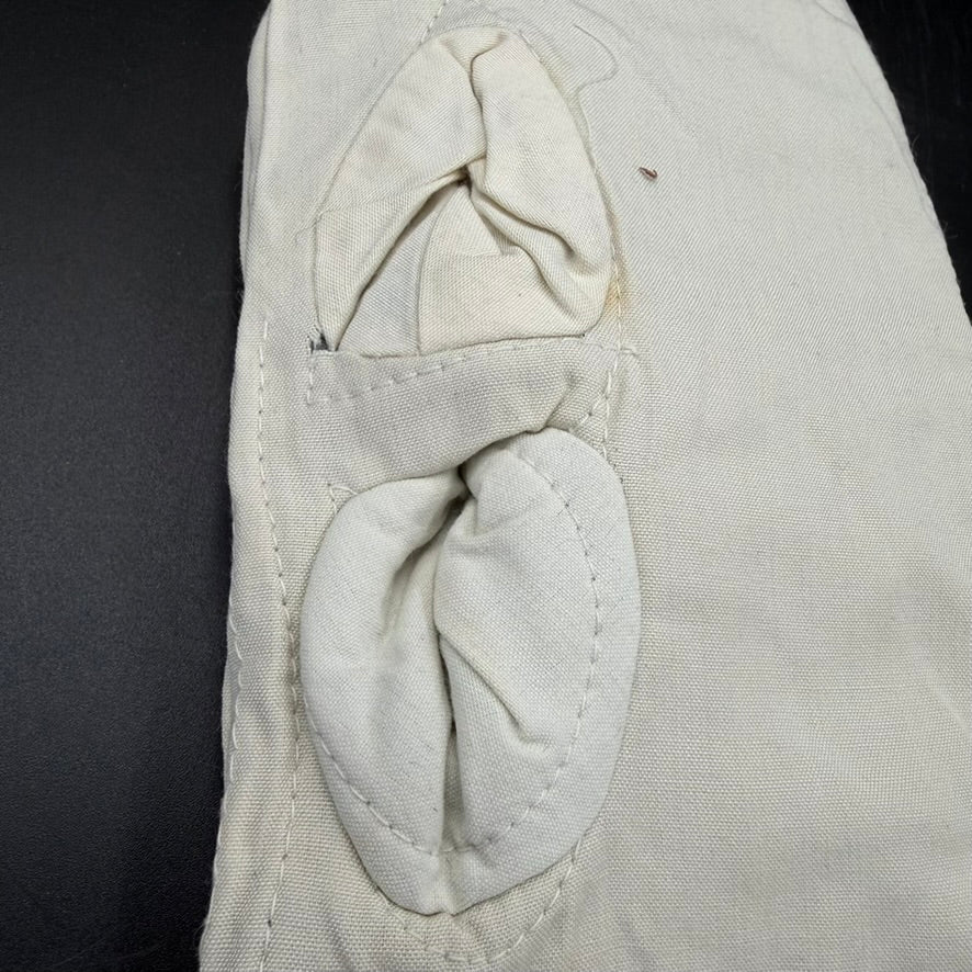 Interior view showing original quilted white cotton lining