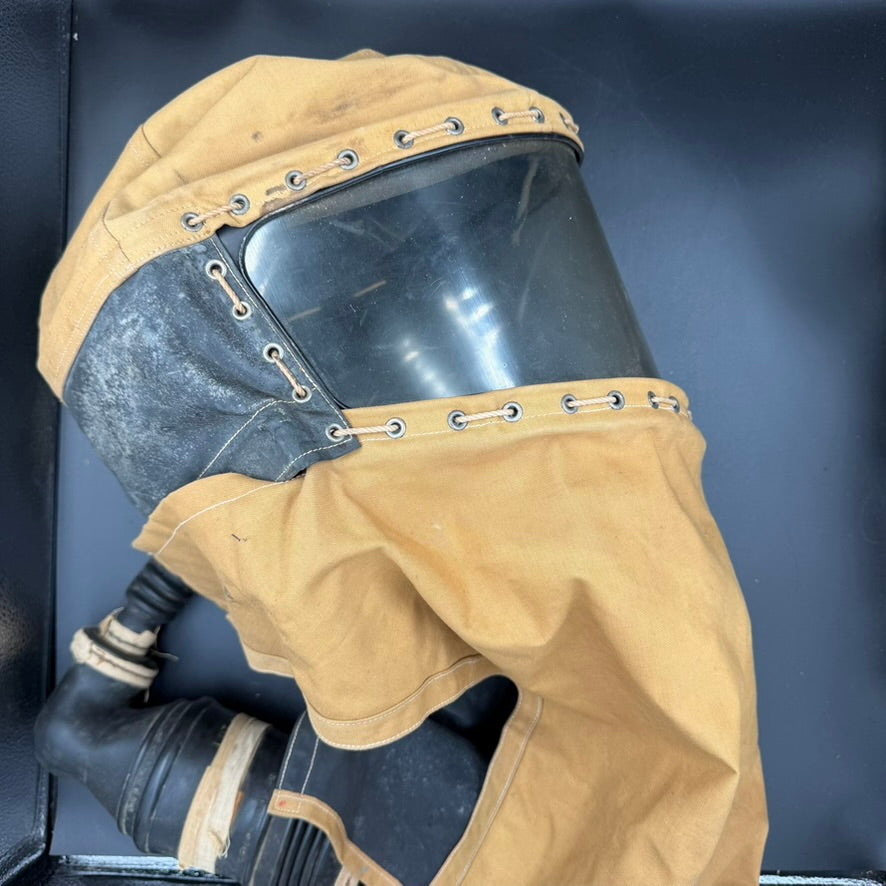 Side view of WWII British Hospital Respirator gas mask showing hose connection and protective hood