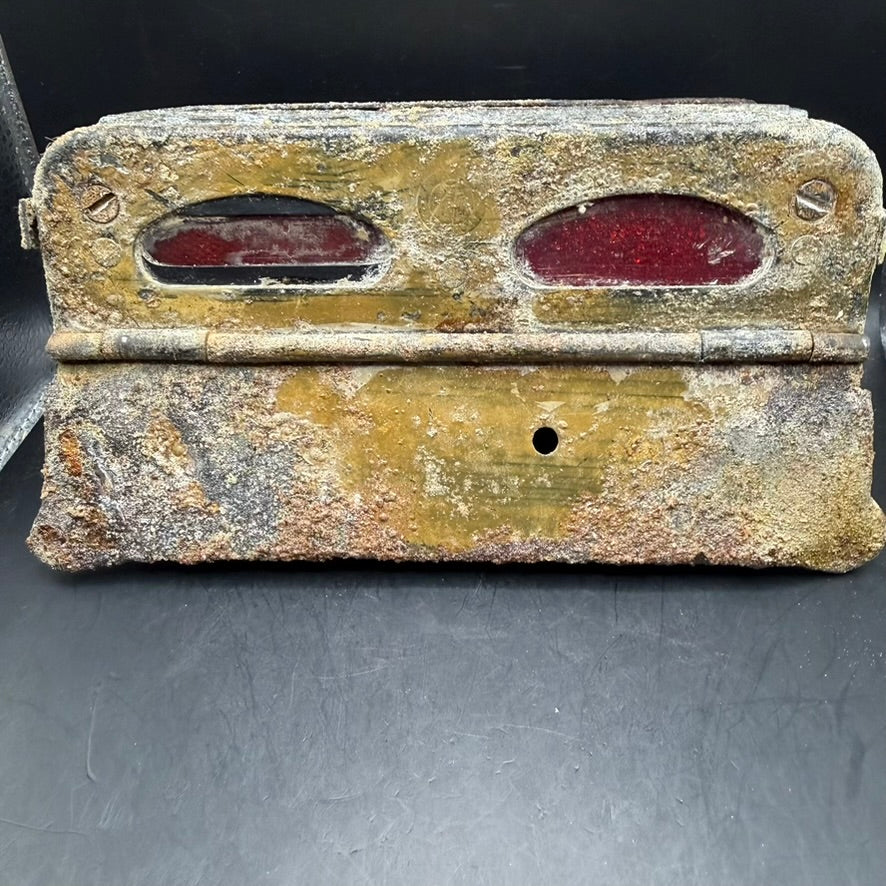 Front view of German Notek tail light showing red convoy lenses