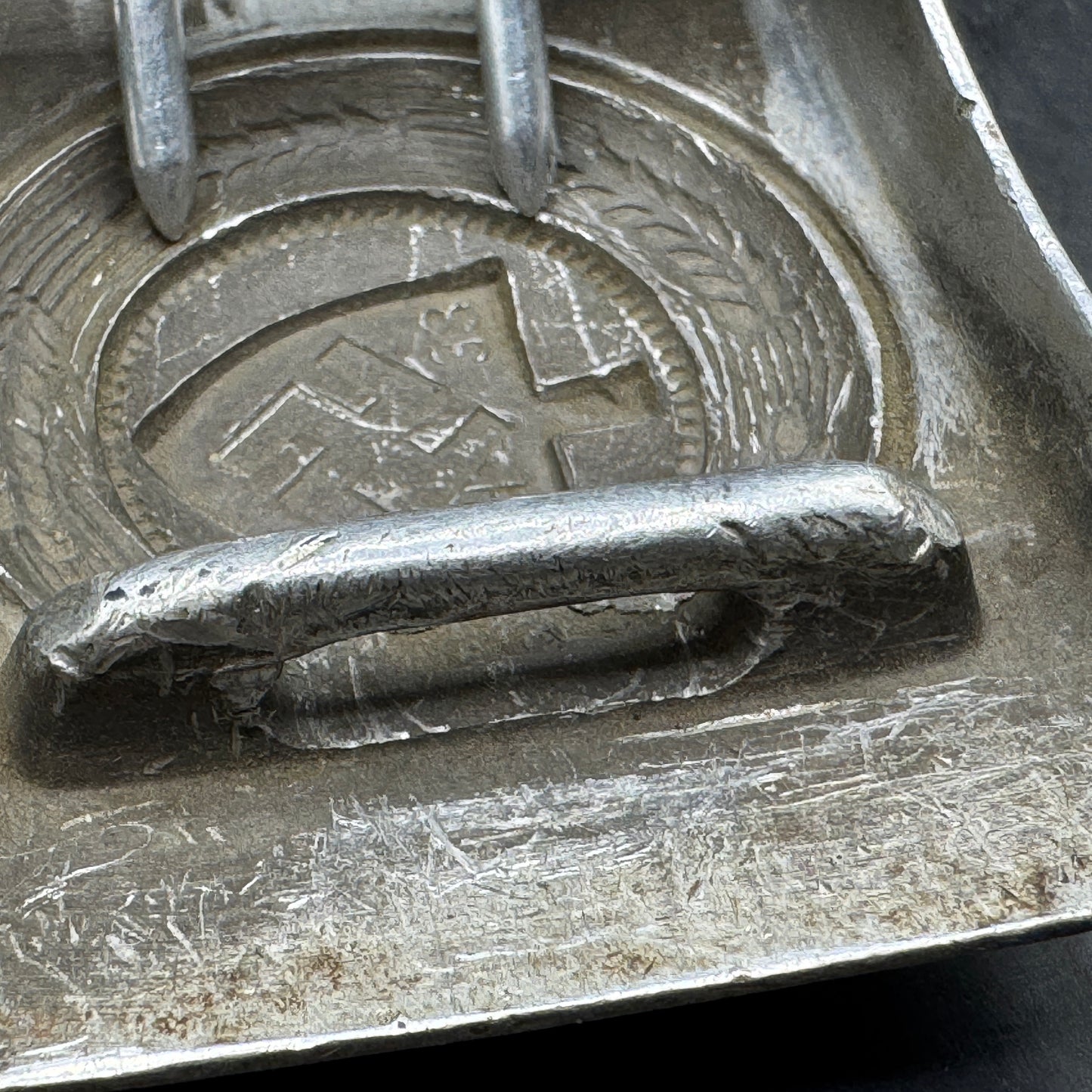 WW2 original artifact – Reichsarbeitsdienst (RAD) buckle (Maker N&H 1938) – interior page