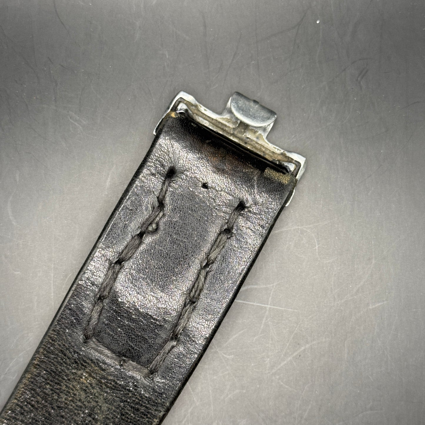 WW2 original artifact – Alumunium Heer Buckle with matching black belt – interior page