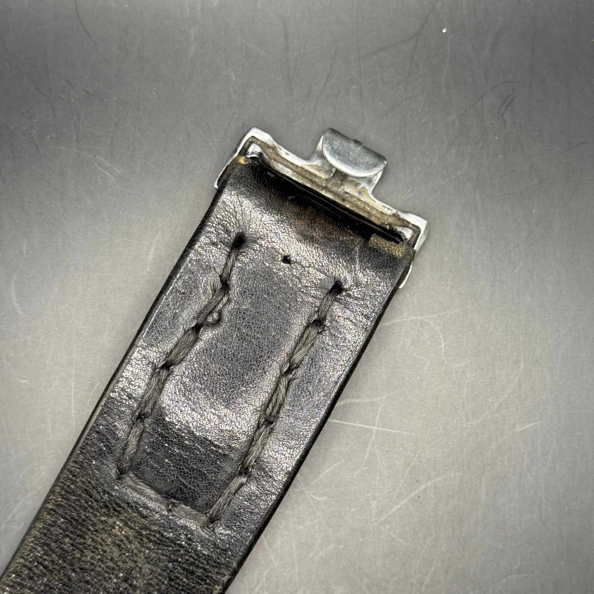 WW2 original artifact – Alumunium Heer Buckle with matching black belt – interior page