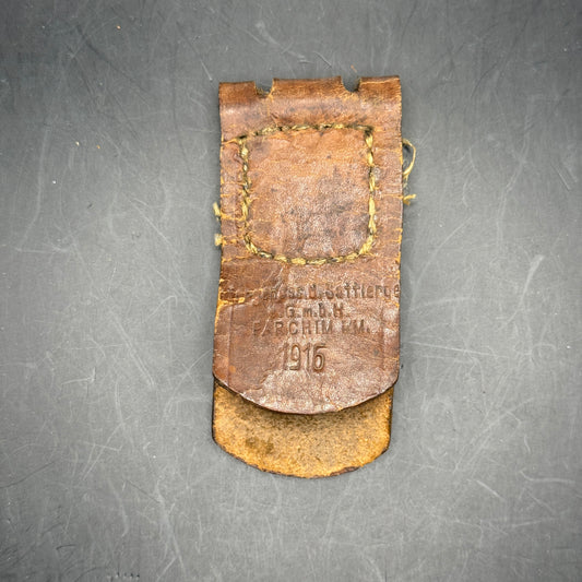 WW2 original artifact – WW1 Leather buckle tab 1916 – AxisArtifacts