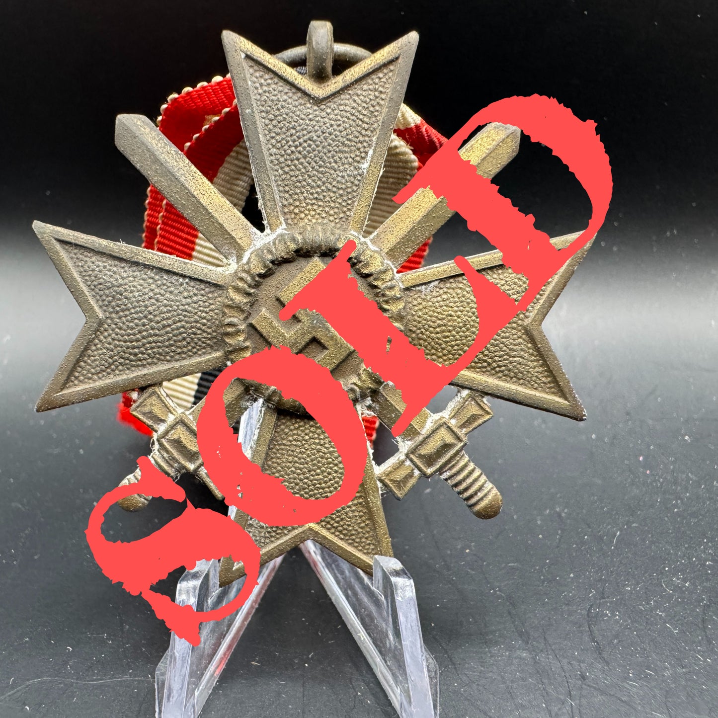 WW2 original artifact – Kriegsverdienst Kreuz with swords andribbon – AxisArtifacts