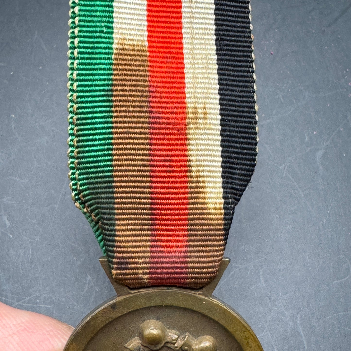 WW2 original artifact – Italian/German African Campaign Medal – interior page