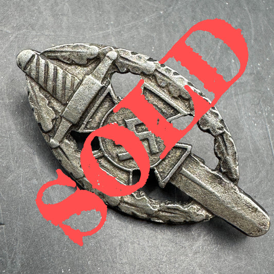 WW2 original artifact – NSKOV membership badge – AxisArtifacts