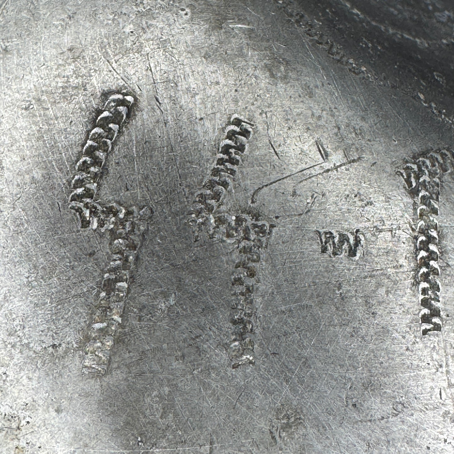 Detail of hand-engraved trench art on WWII German SS canteen, applied during wartime service