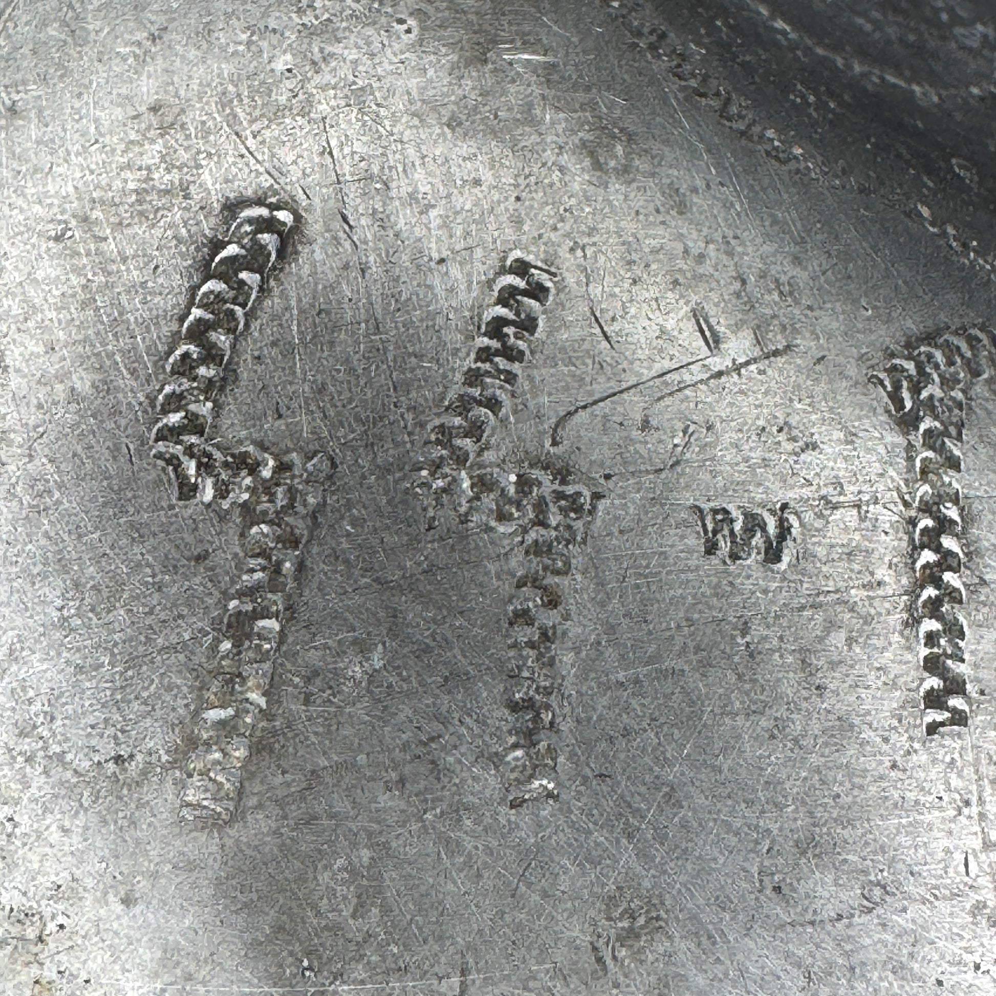 Detail of hand-engraved trench art on WWII German SS canteen, applied during wartime service