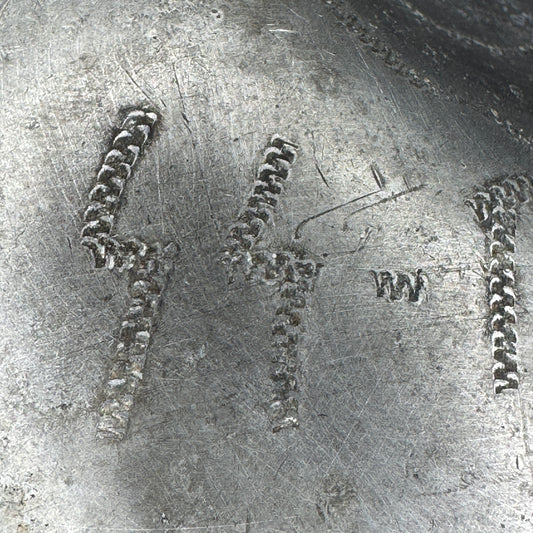 Detail of hand-engraved trench art on WWII German SS canteen, applied during wartime service