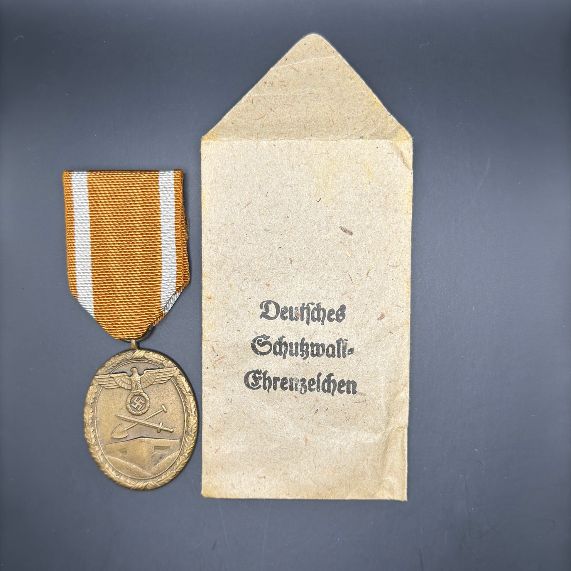 WW2 original artifact – Westwall medal with packet – interior page