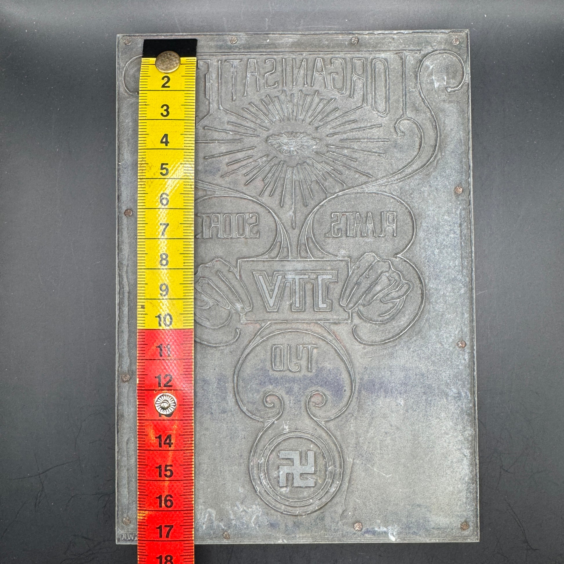 Height measurement of original WWII Dutch propaganda printing plate, metal letterpress plate on wood