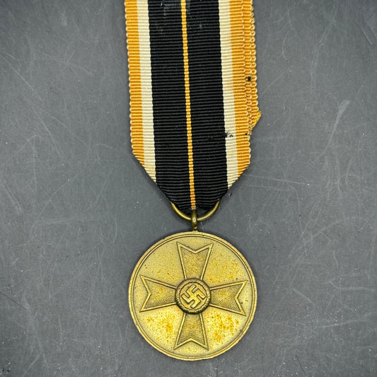 WW2 original artifact – Kriegsverdienst Medal with original ribbon – interior detail
