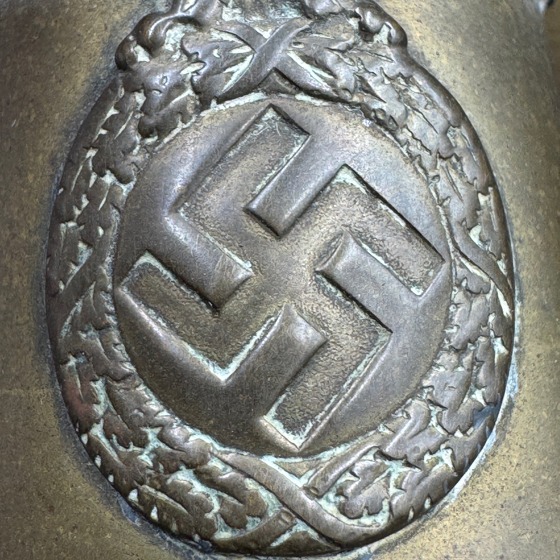 Detailed view of original SA eagle with swastika on bugle bell