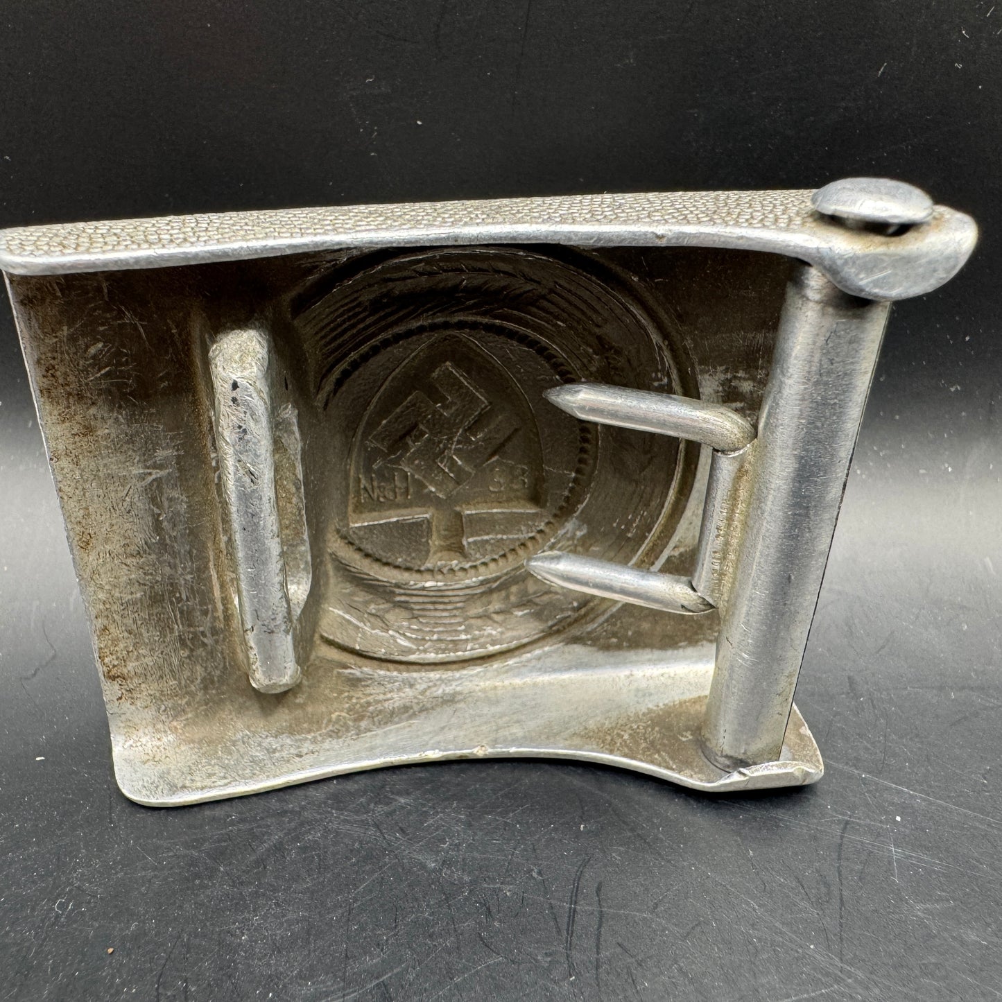 WW2 original artifact – Reichsarbeitsdienst (RAD) buckle (Maker N&H 1938) – interior detail