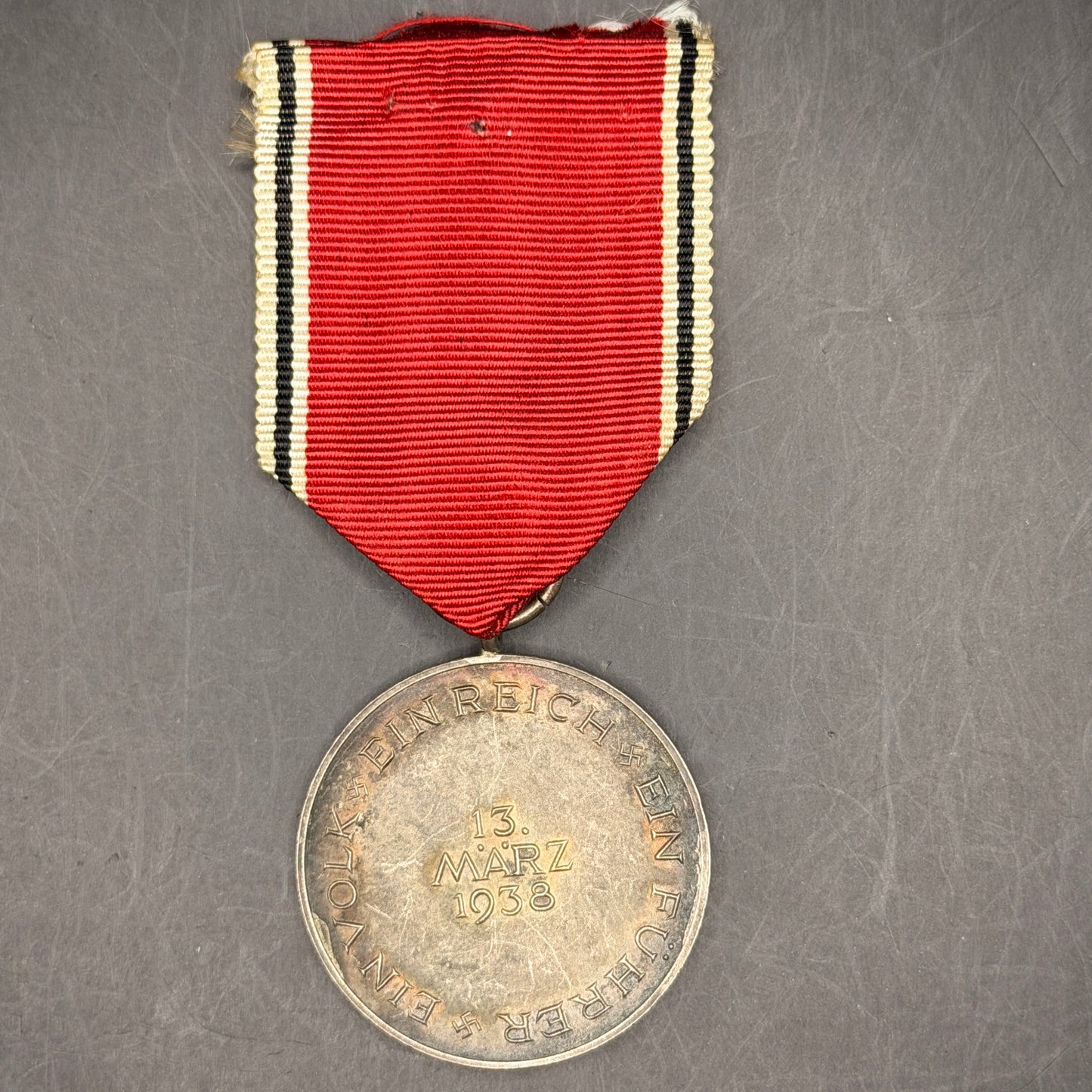 WW2 original artifact – Anschluss Medal (Austria Annexation) with Original Ribbon – interior detail