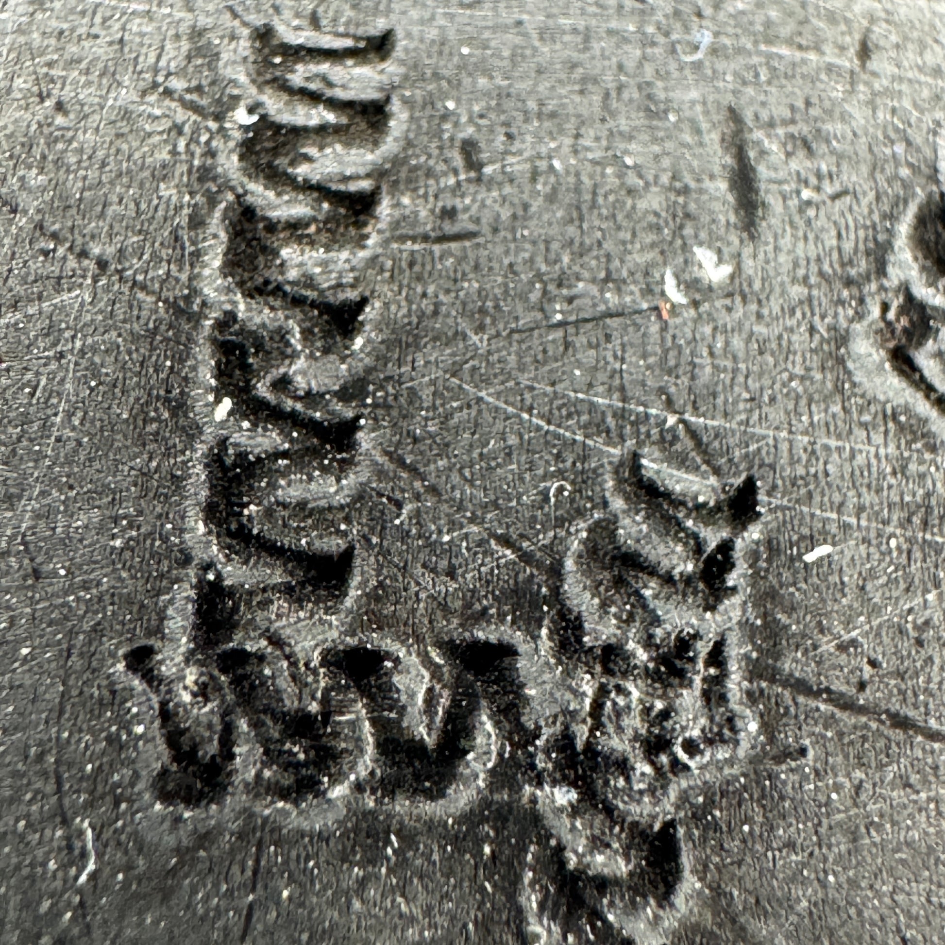 Close-up of additional hand-carved markings on WWII German canteen trench art
