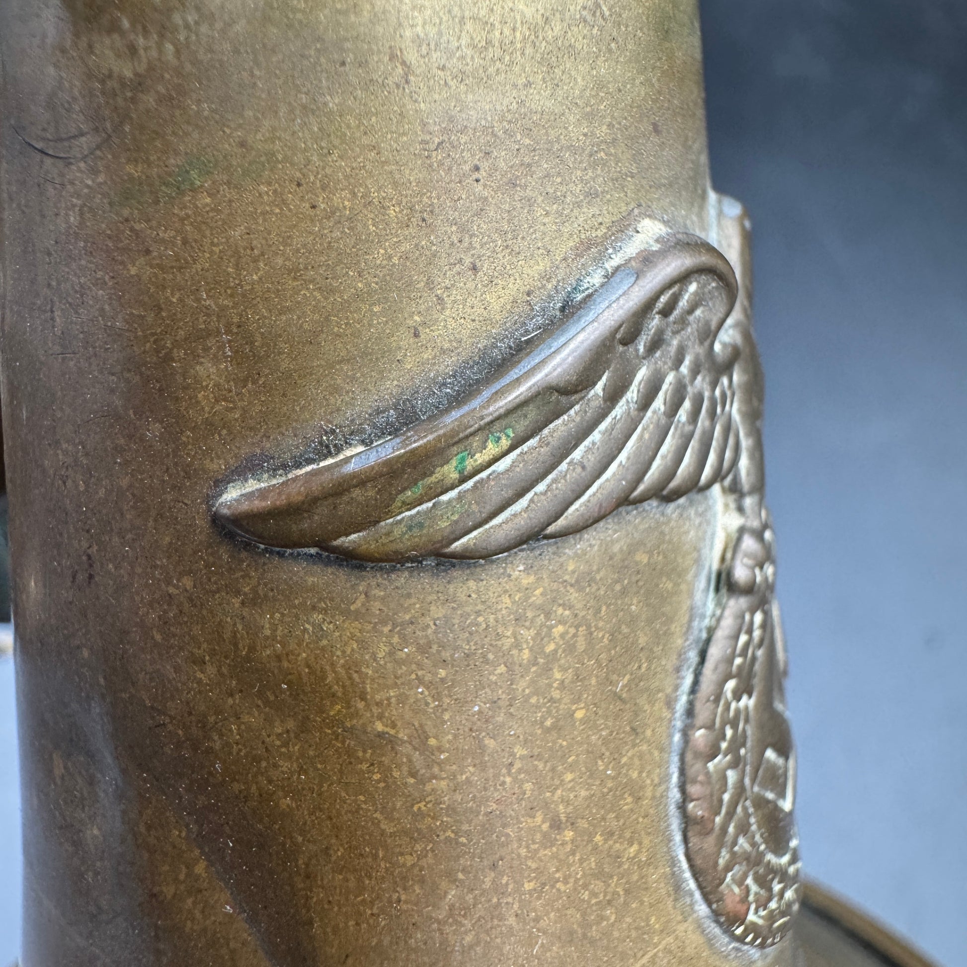 Side detail of applied SA eagle emblem on early German bugle