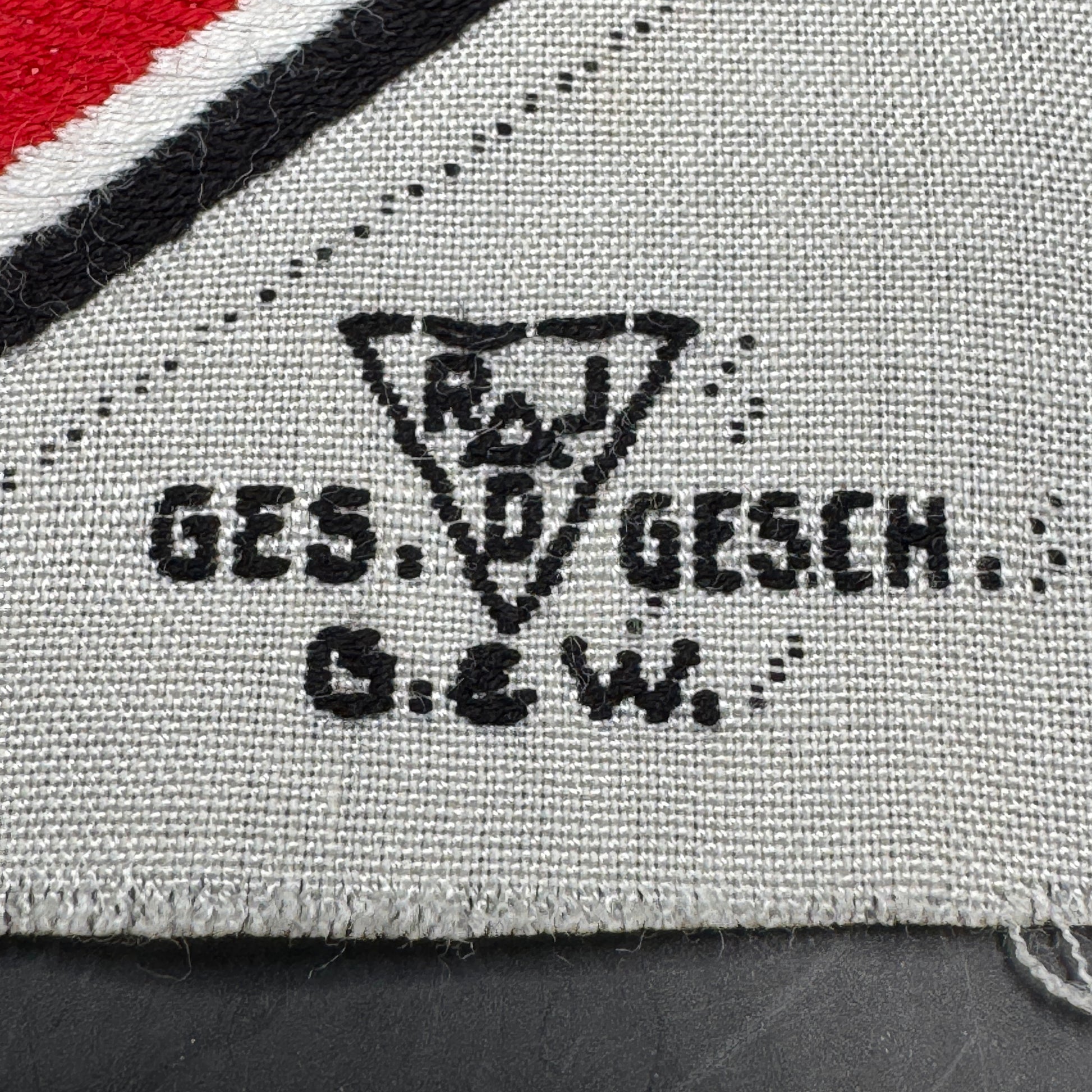 WW2 original artifact – Unissued Original Third Reich RAD (German Labor Service) Small Sports Patch – interior detail