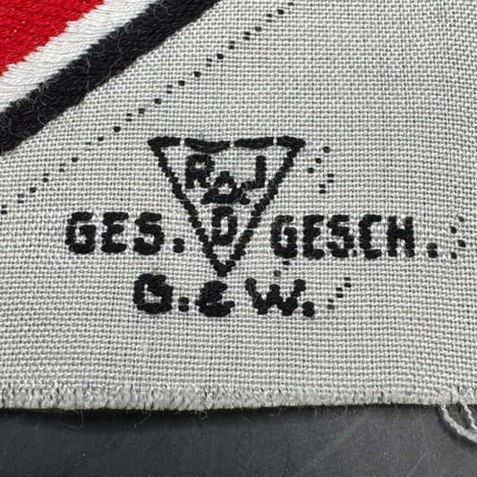 WW2 original artifact – Unissued Original Third Reich RAD (German Labor Service) Small Sports Patch – interior detail