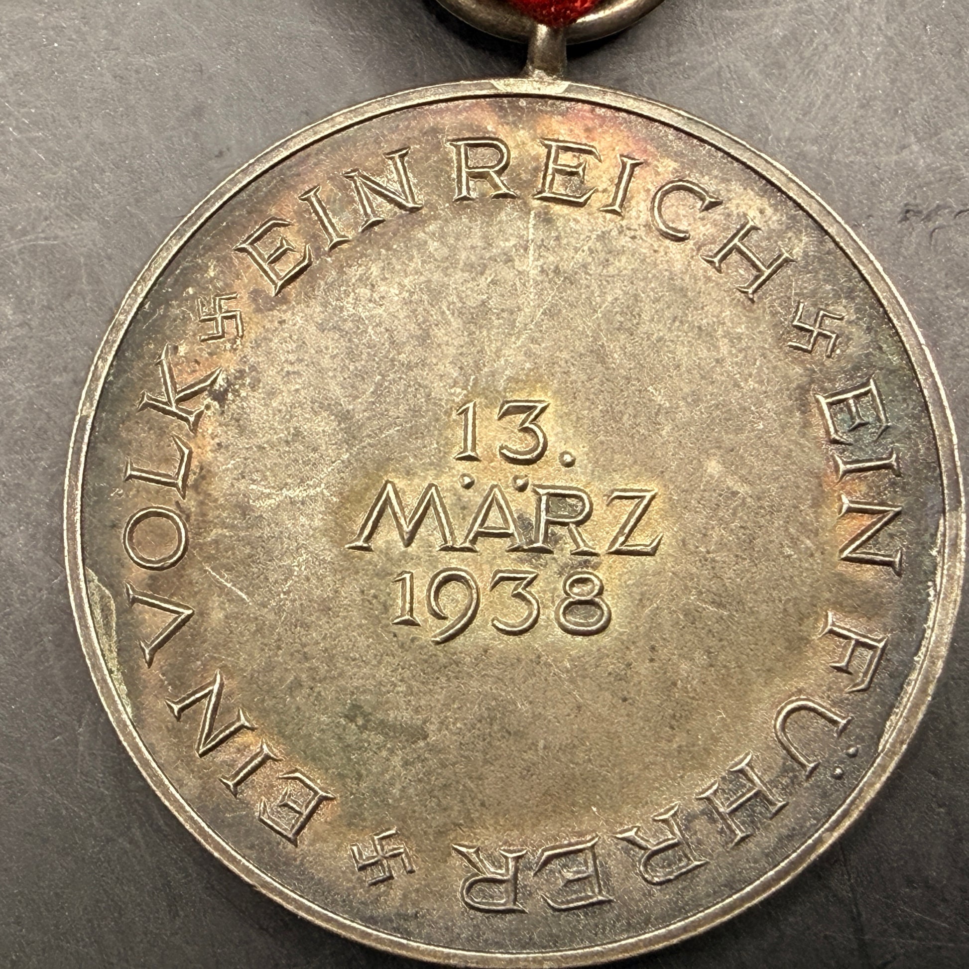 WW2 original artifact – Anschluss Medal (Austria Annexation) with Original Ribbon – interior page