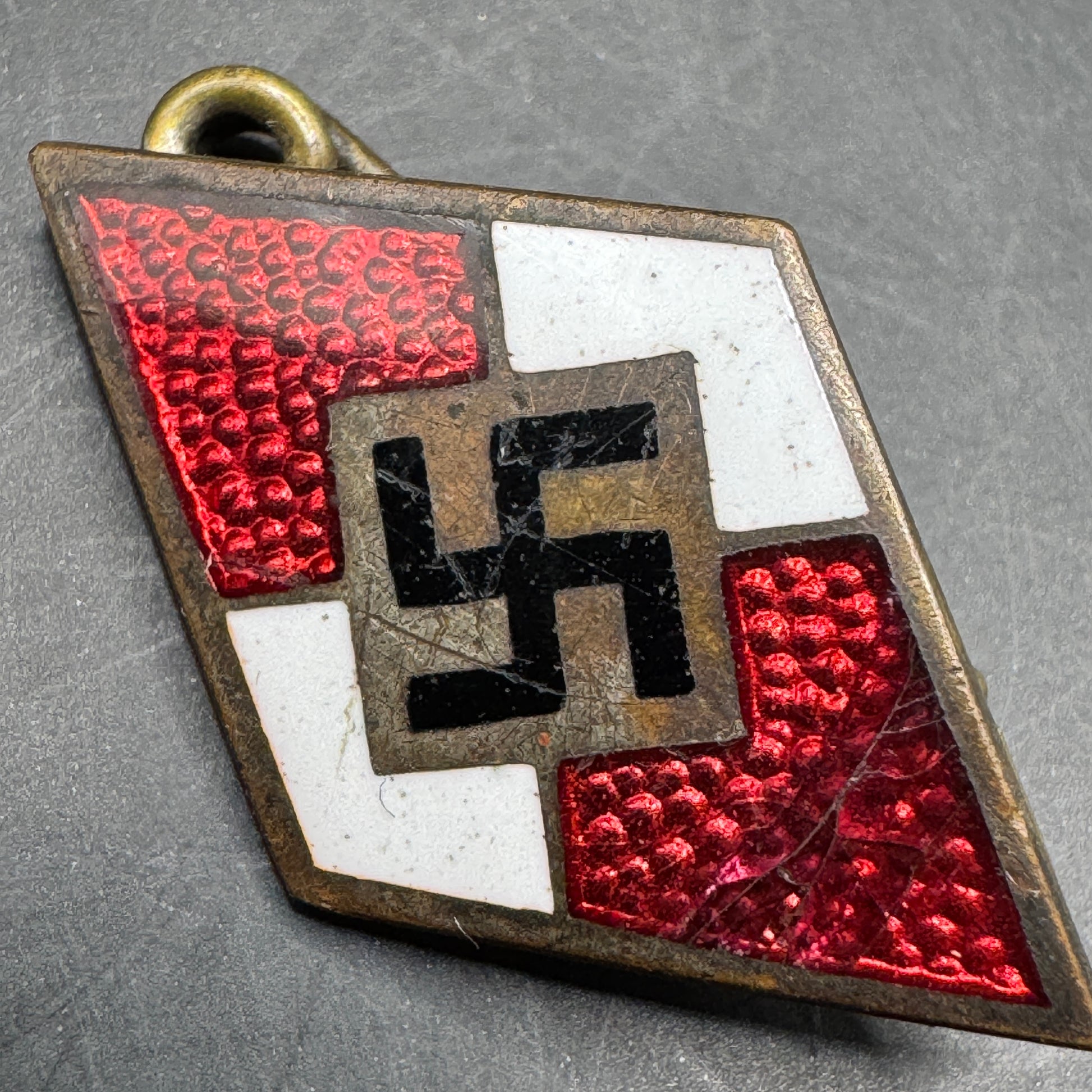 WW2 original artifact – Hitler Jugend cap badge M1/31 – interior title page