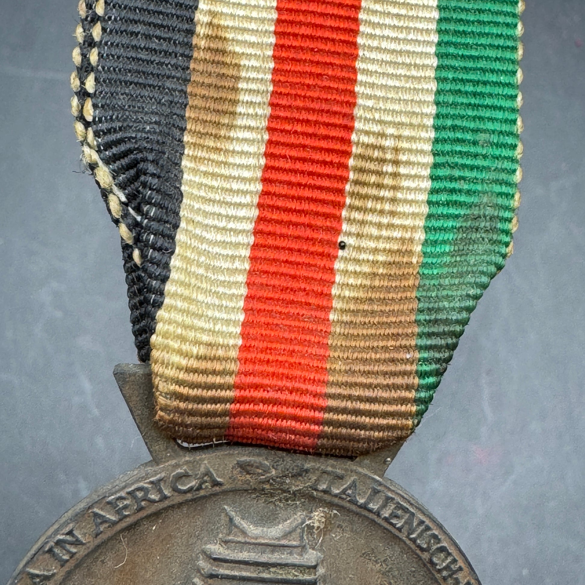 WW2 original artifact – Italian/German African Campaign Medal – interior page