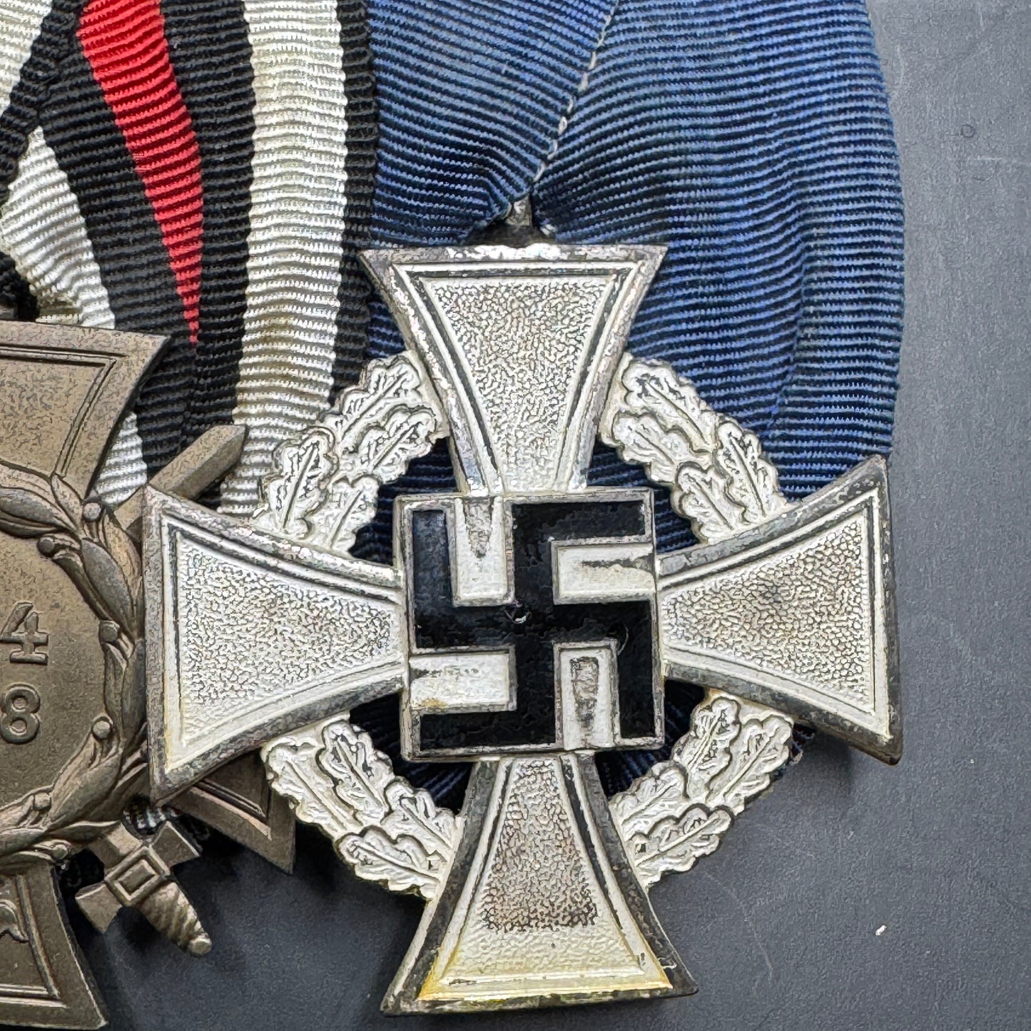 WW2 original artifact – 2-Medal Bar: Treue Dienst Medal & Hindenburg Cross for Combatants – interior title page