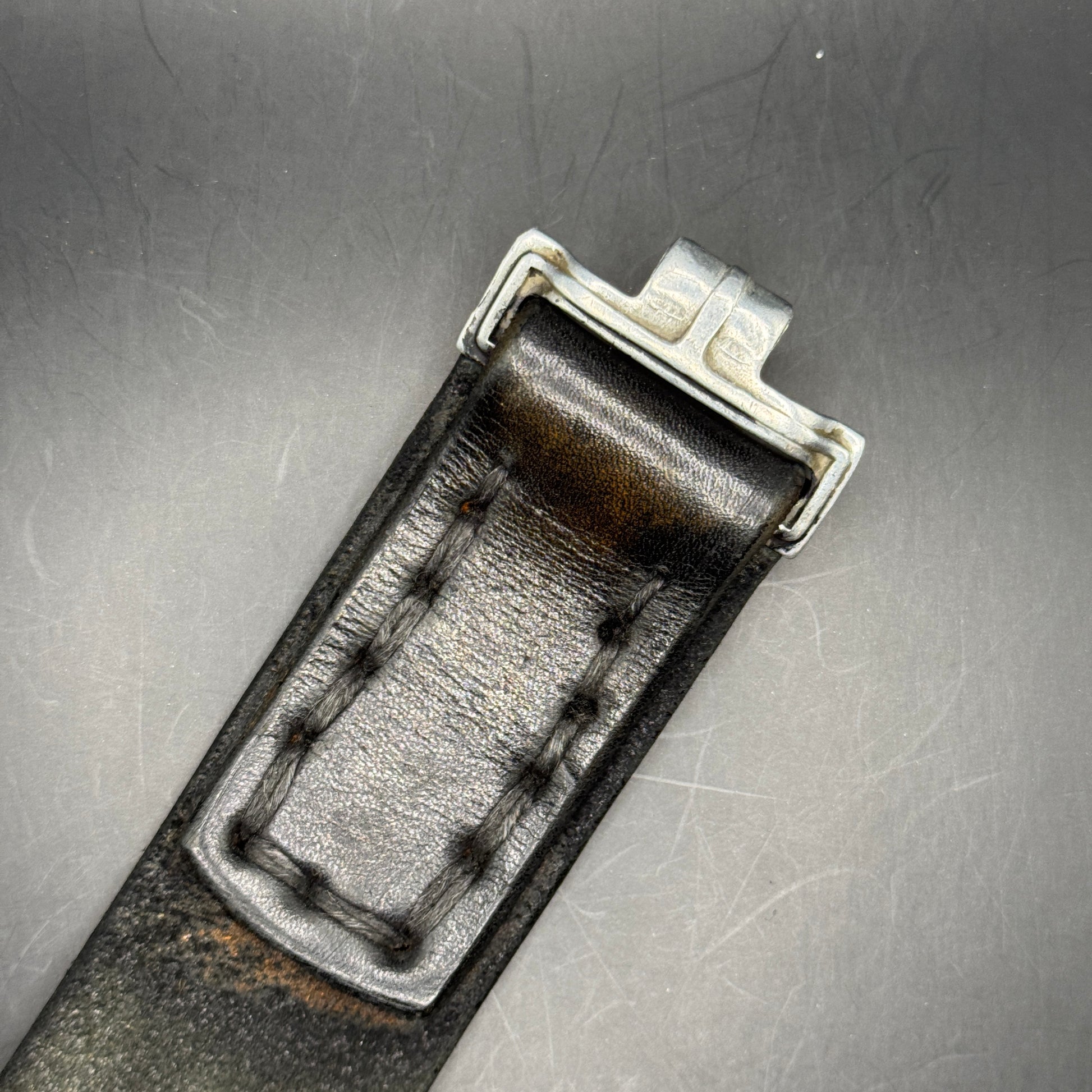 WW2 original artifact – Alumunium Heer Buckle with matching black belt – interior page