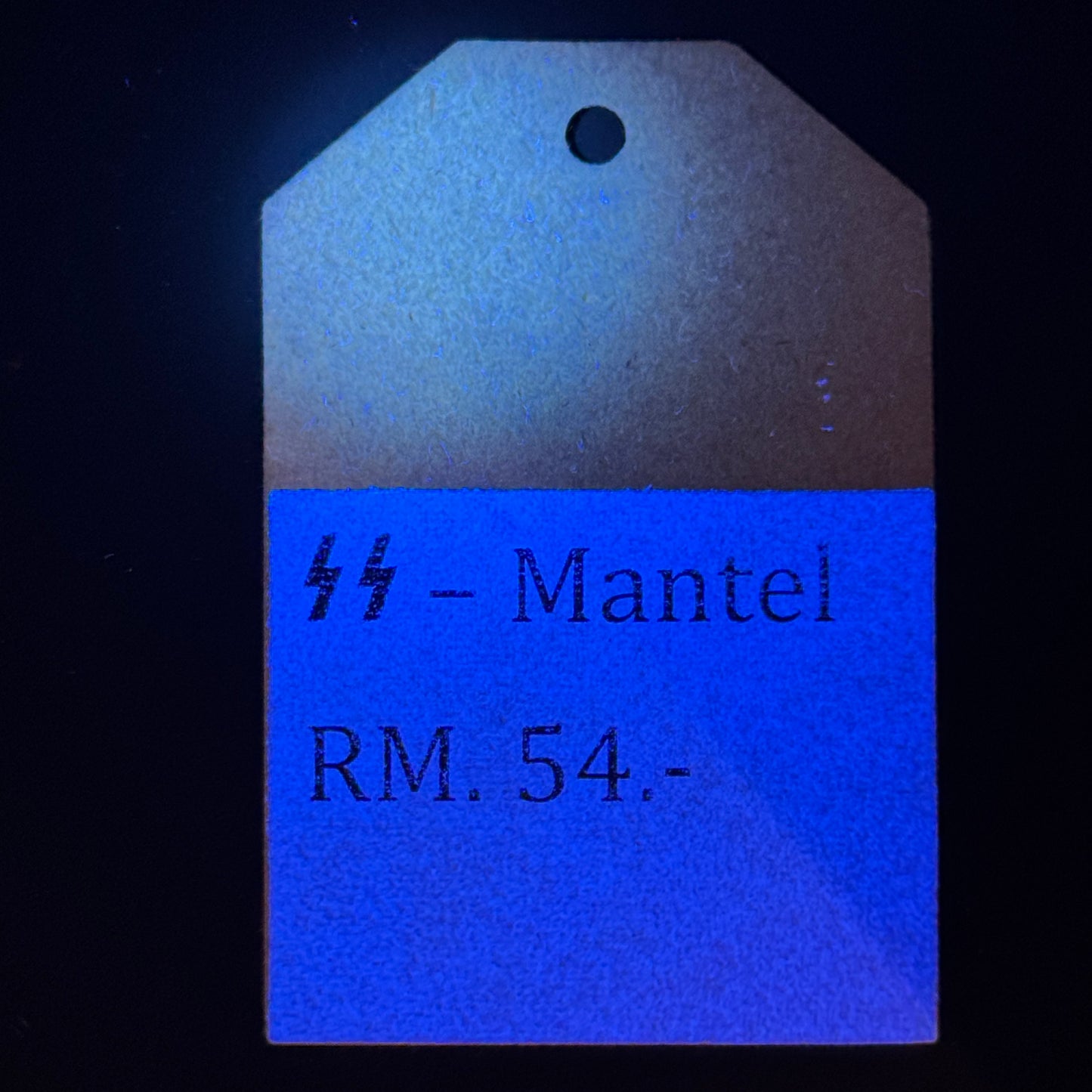 WW2 original artifact – SS Clothing Tag from Peek & Cloppenburg (SS Overcoat) – interior title page