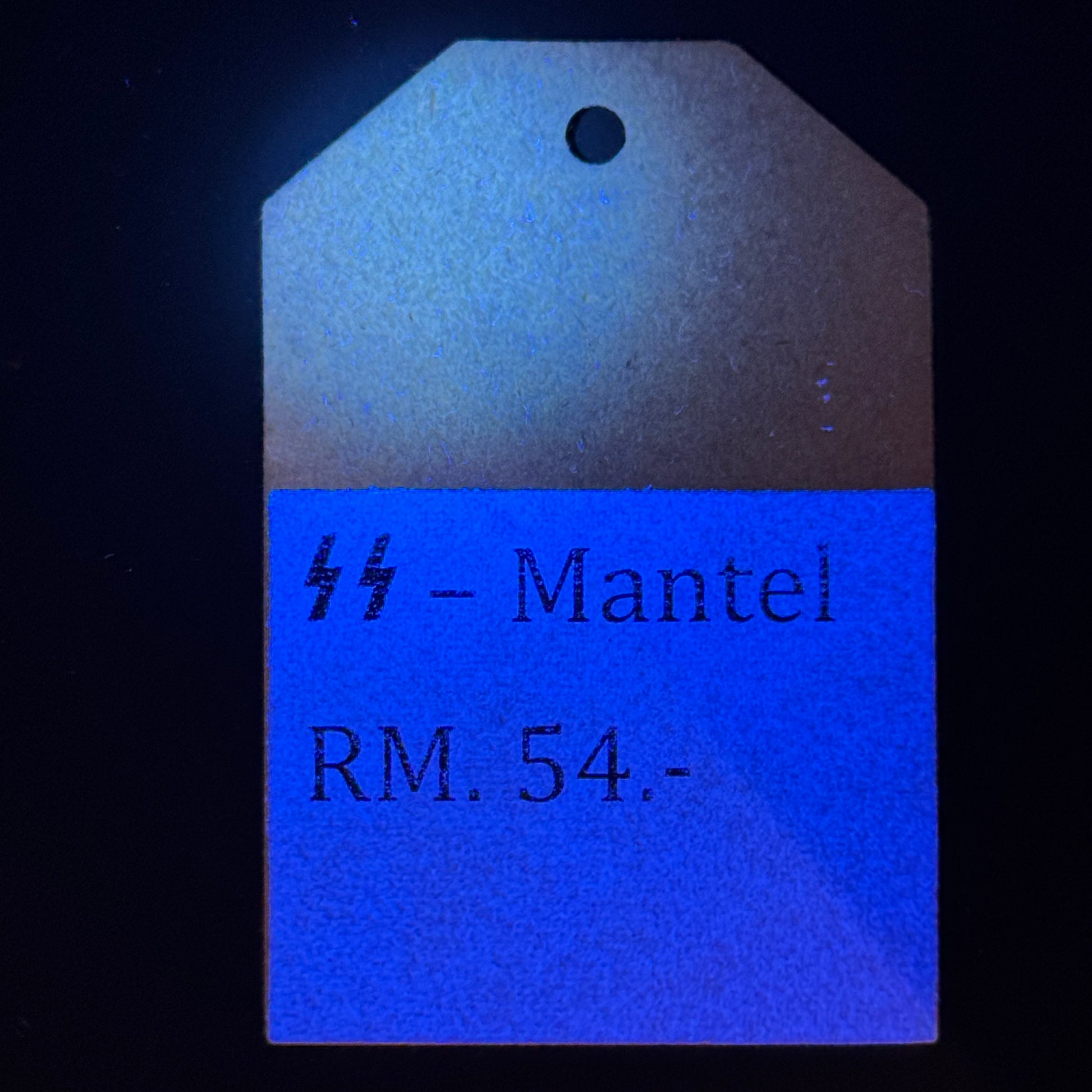 WW2 original artifact – SS Clothing Tag from Peek & Cloppenburg (SS Overcoat) – interior title page