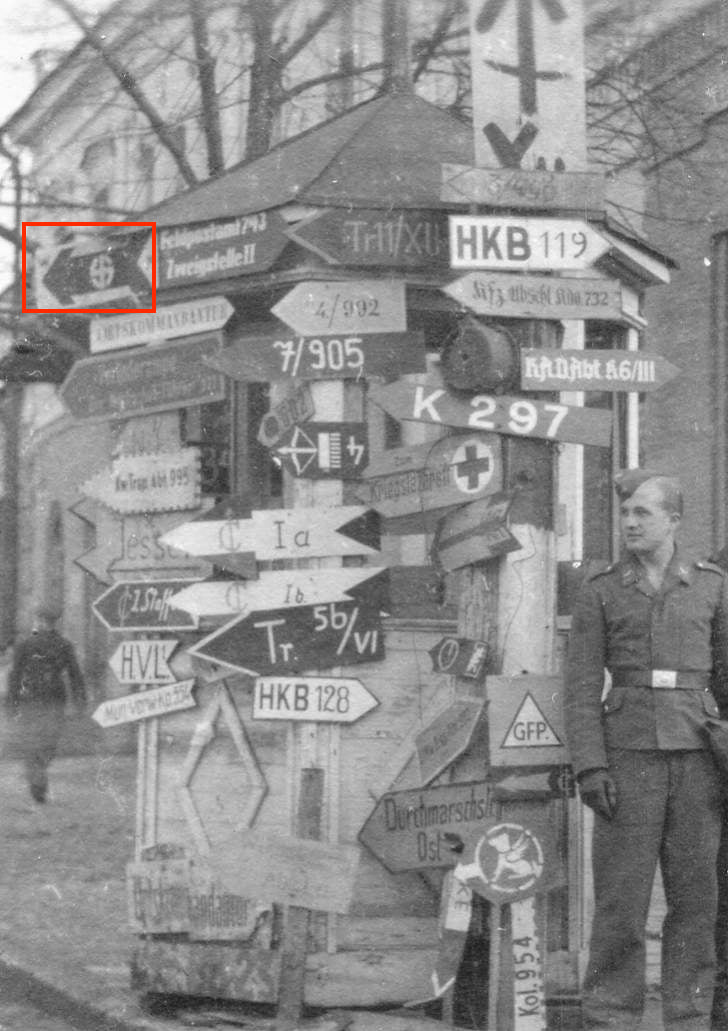 Original WW2 photograph showing German military direction signs used by Waffen-SS units