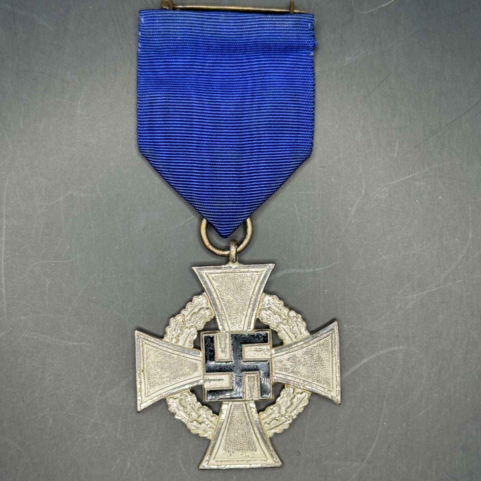 WW2 original artifact – German Treue Dienst Medal – interior title page