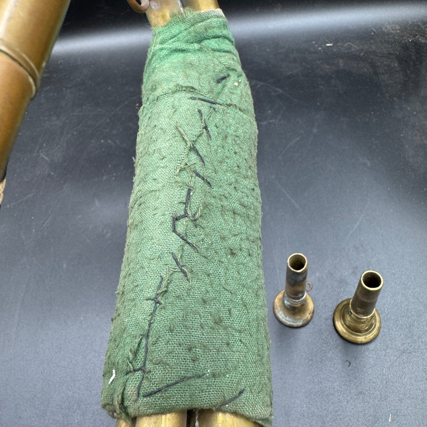 Original fabric wrapping on tubing of early German SA bugle