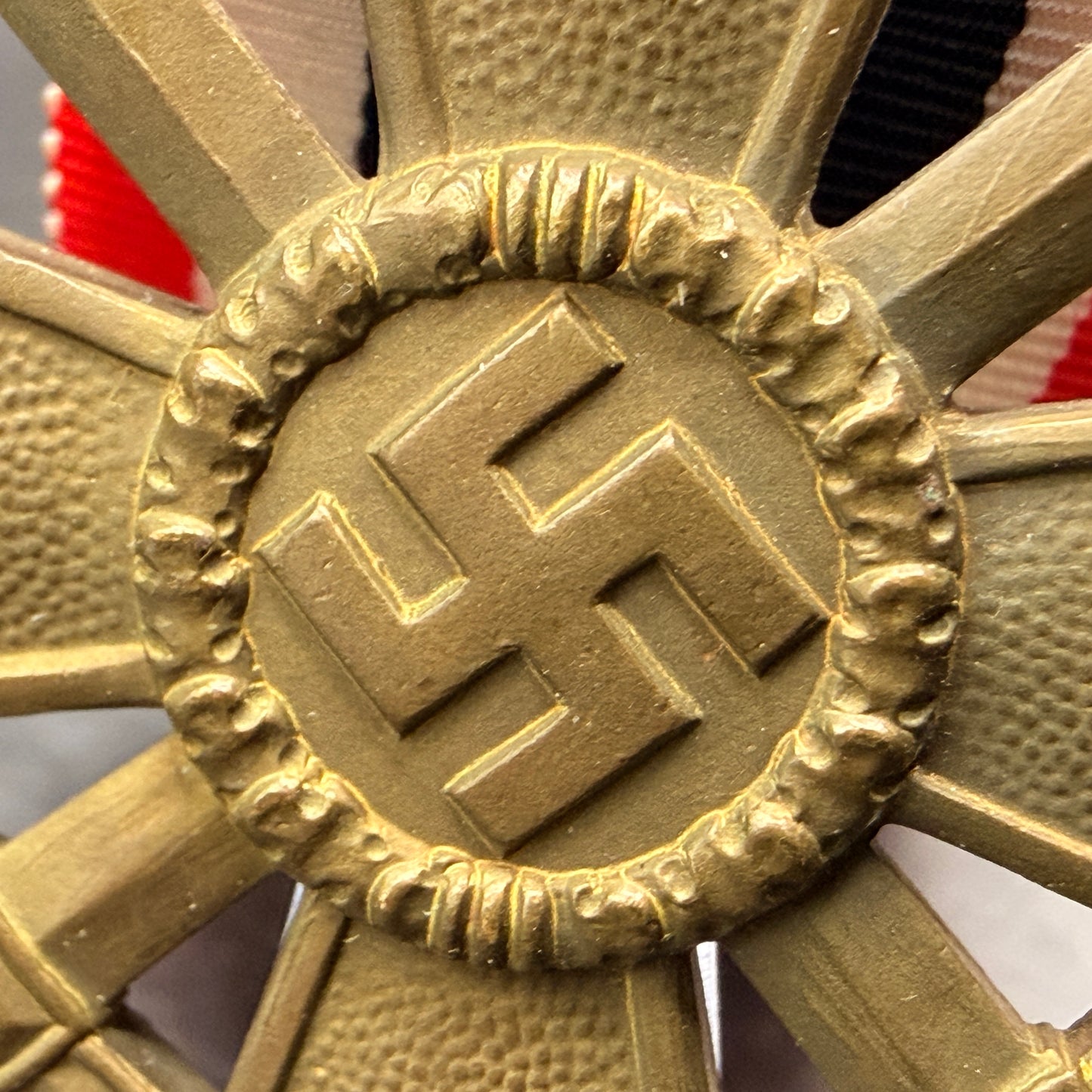 WW2 original artifact – Kriegsverdienst Kreuz with Swords and ribbon – interior title page