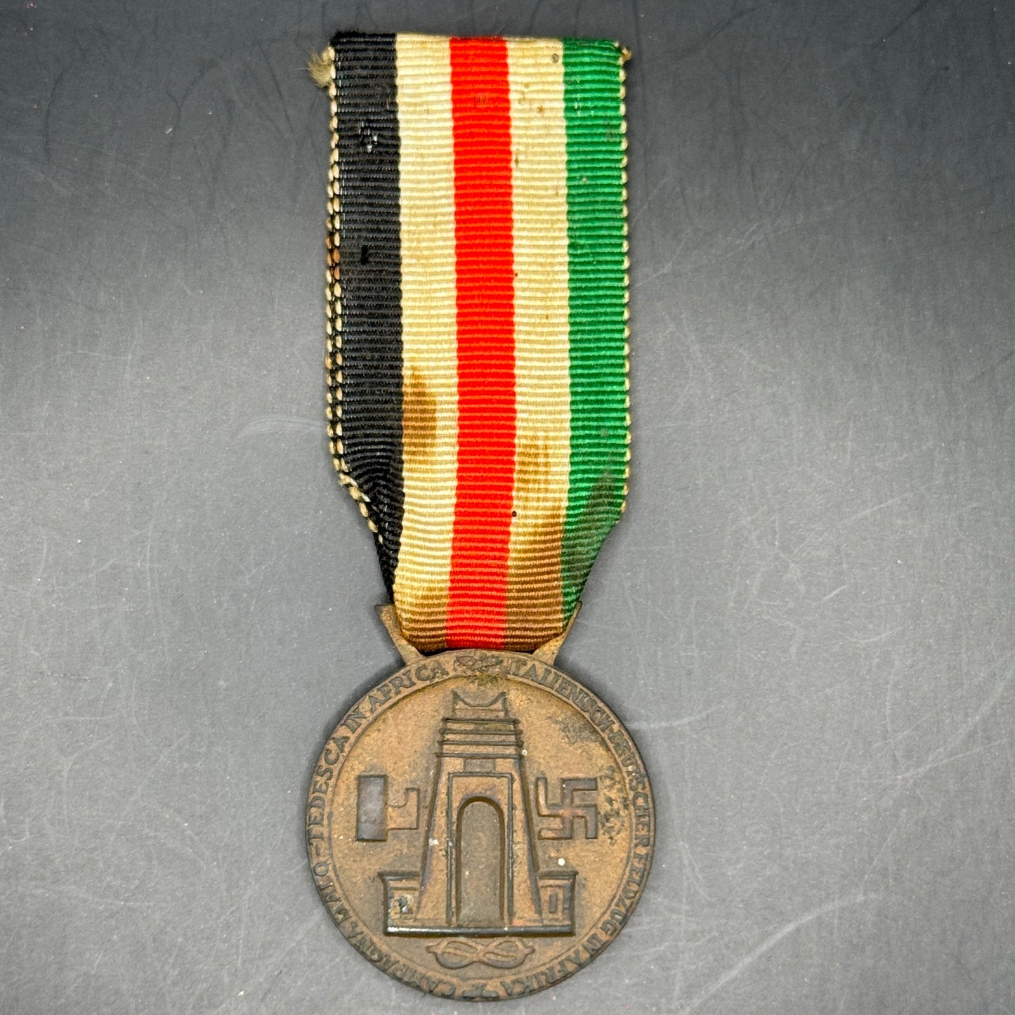 WW2 original artifact – Italian/German African Campaign Medal – interior page