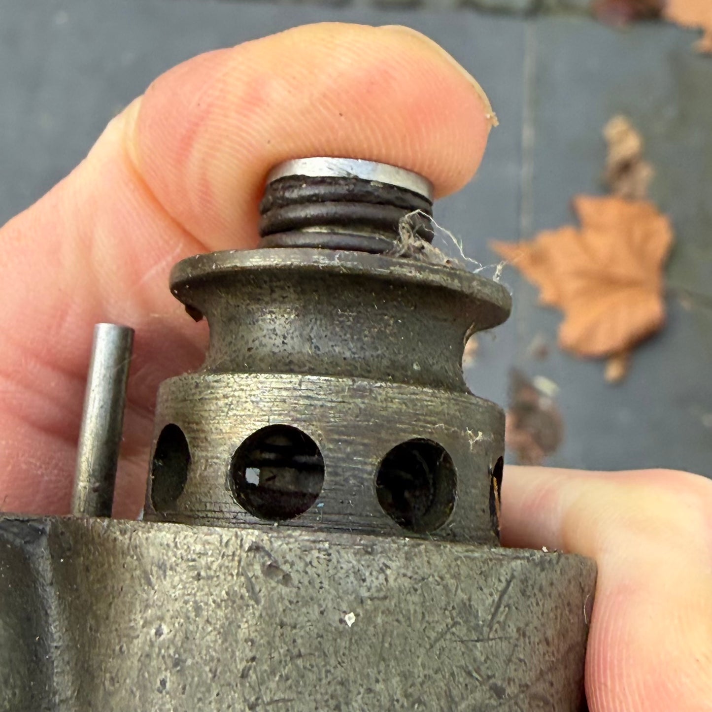 Valve pushed from Museum-sourced RAF Lancaster fire extinguisher from WWII