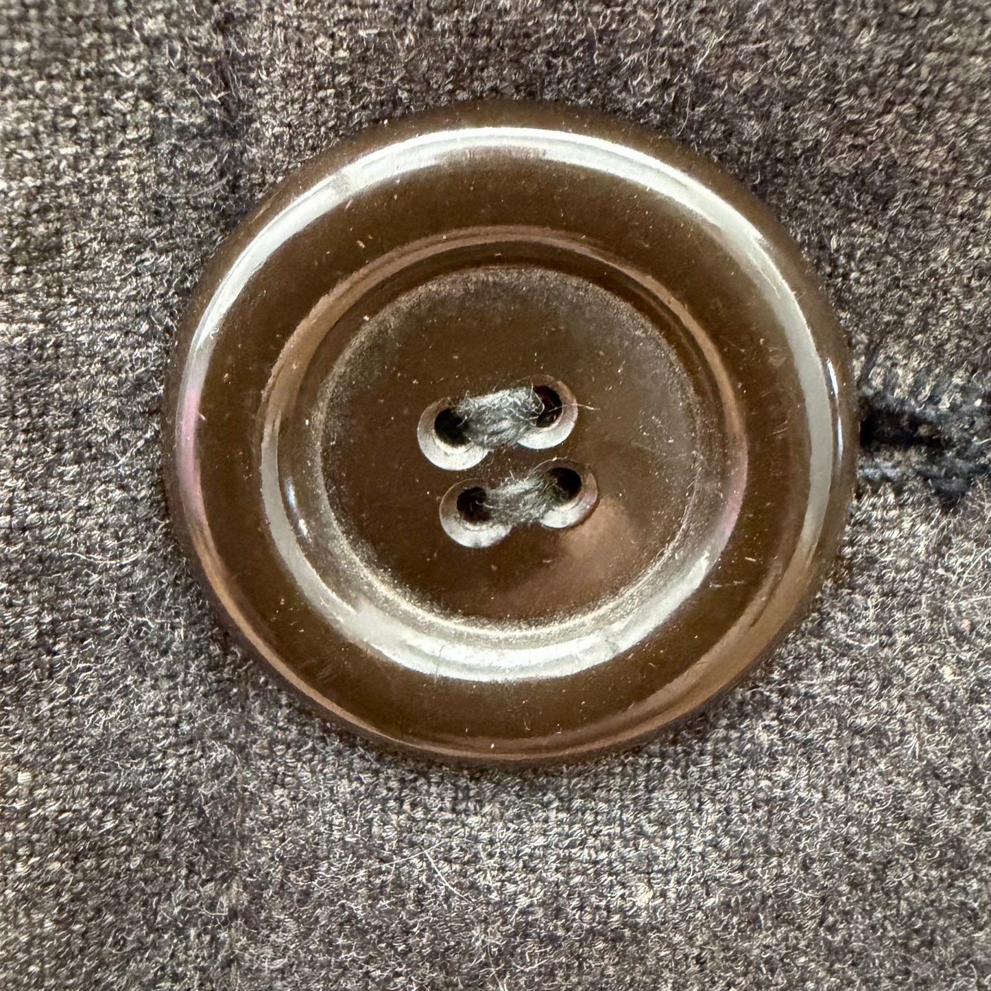 Original wartime German uniform button on heavy wool private tailored coat