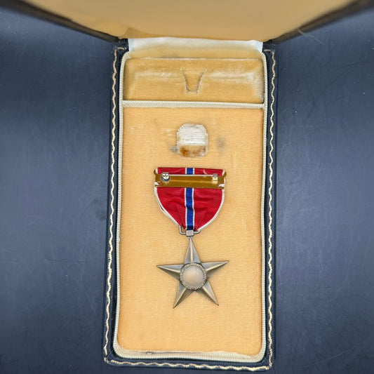 WWII United States Bronze Star Medal in mint condition displayed in presentation case